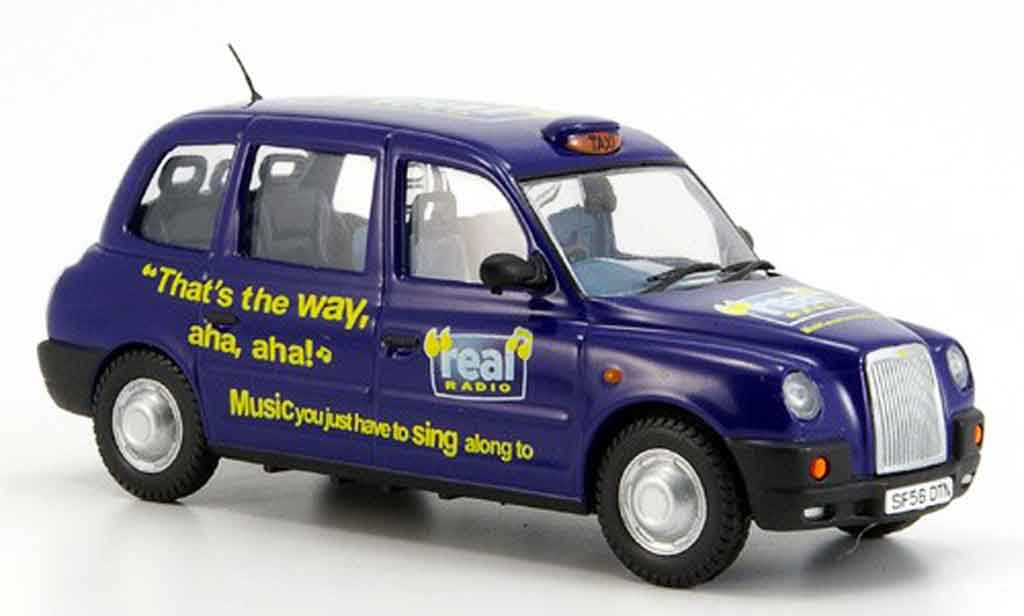 Austin TX4 1/43 Oxford Taxi blauw Real Radio modelauto