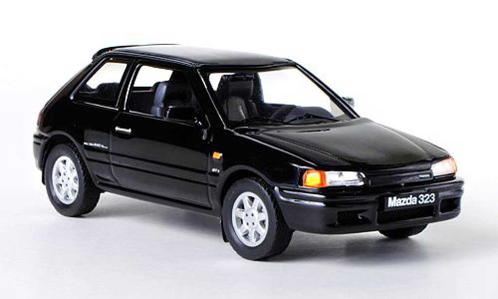 Mazda 323 1/43 IXO GTX zwart LHD 1989 modelauto