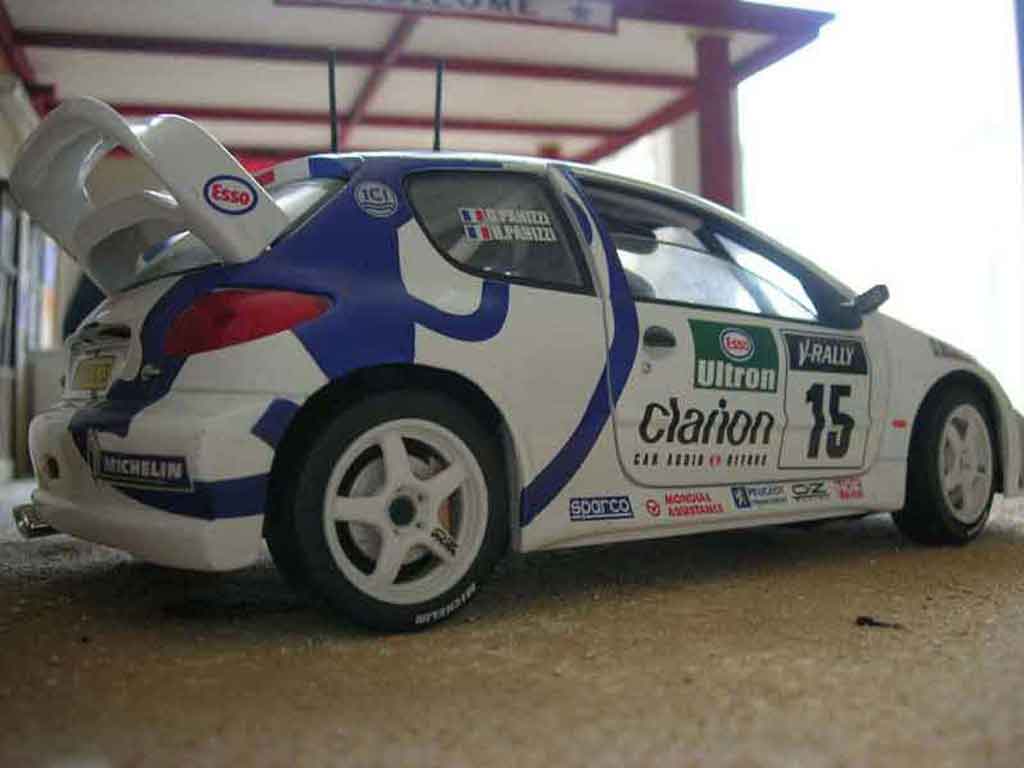 Peugeot 206 WRC 1999 # 15 Clarion Panizzi wit 1/18 Solido