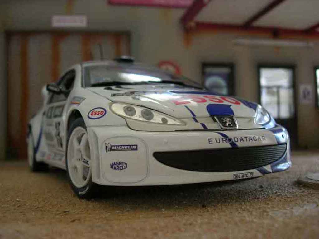 Peugeot 206 WRC 1999 # 15 Clarion Panizzi wit 1/18 Solido