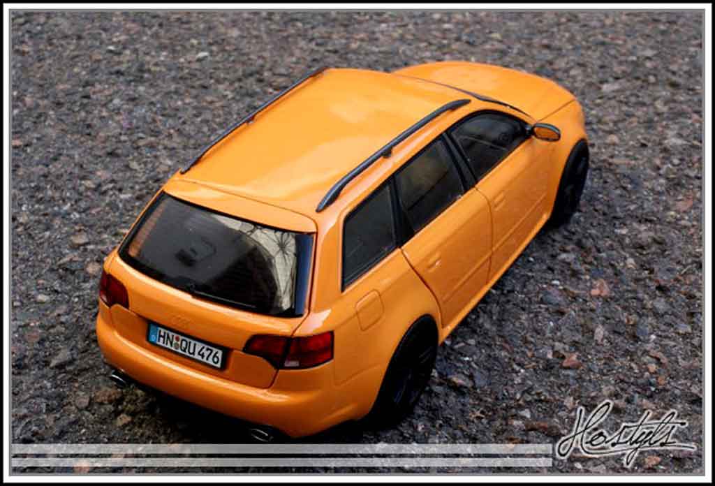 Audi RS4 avant oranje papaye 1/18 Minichamps