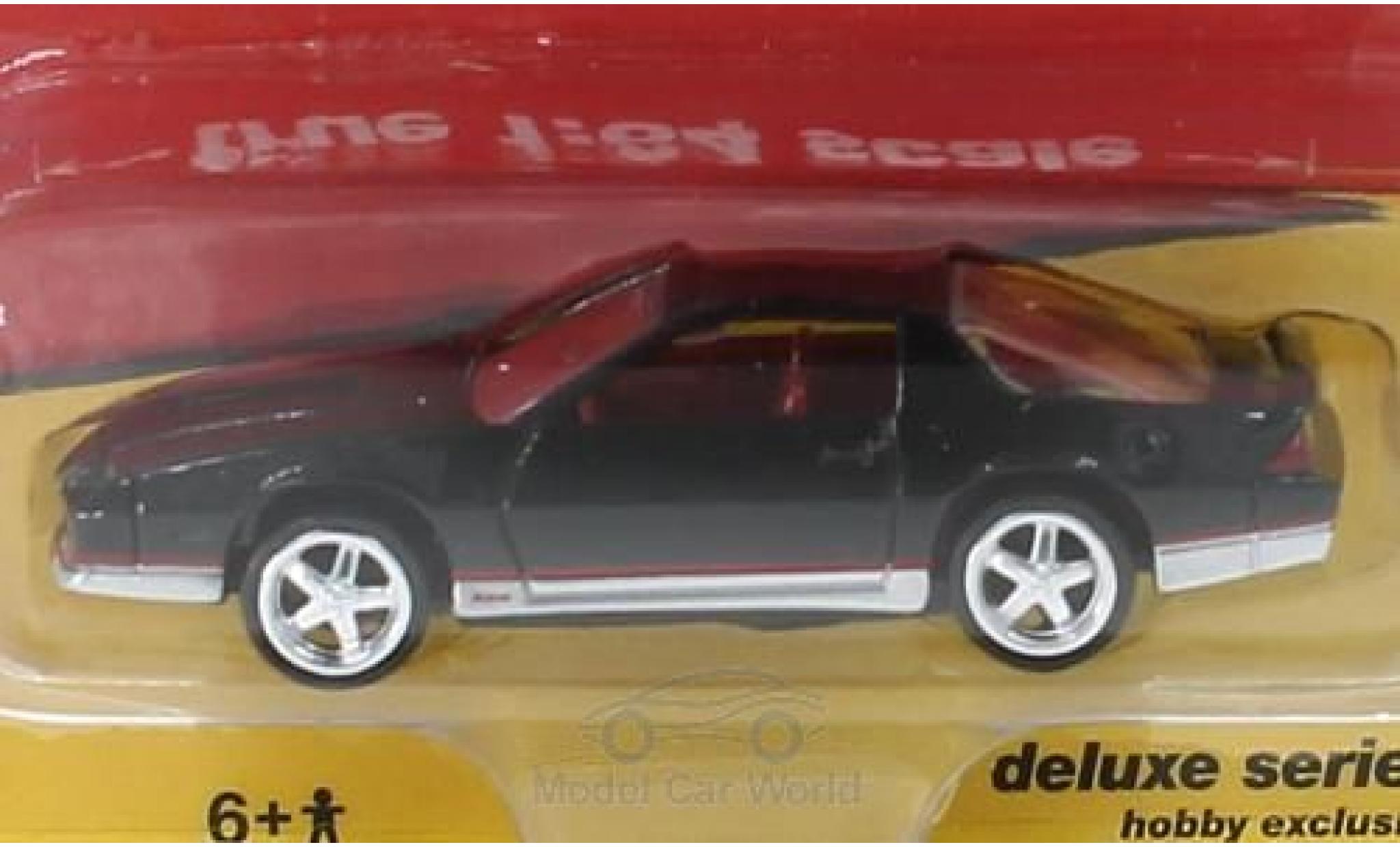 Chevrolet Camaro 1/64 Auto World zwart 1984 modelauto