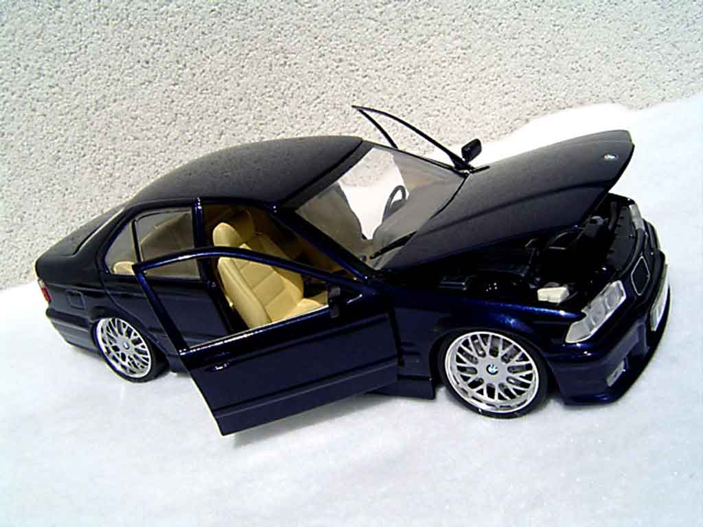 Bmw 325 kit m3 E36 sedan tds blauw metallized 1/18 Ut Models