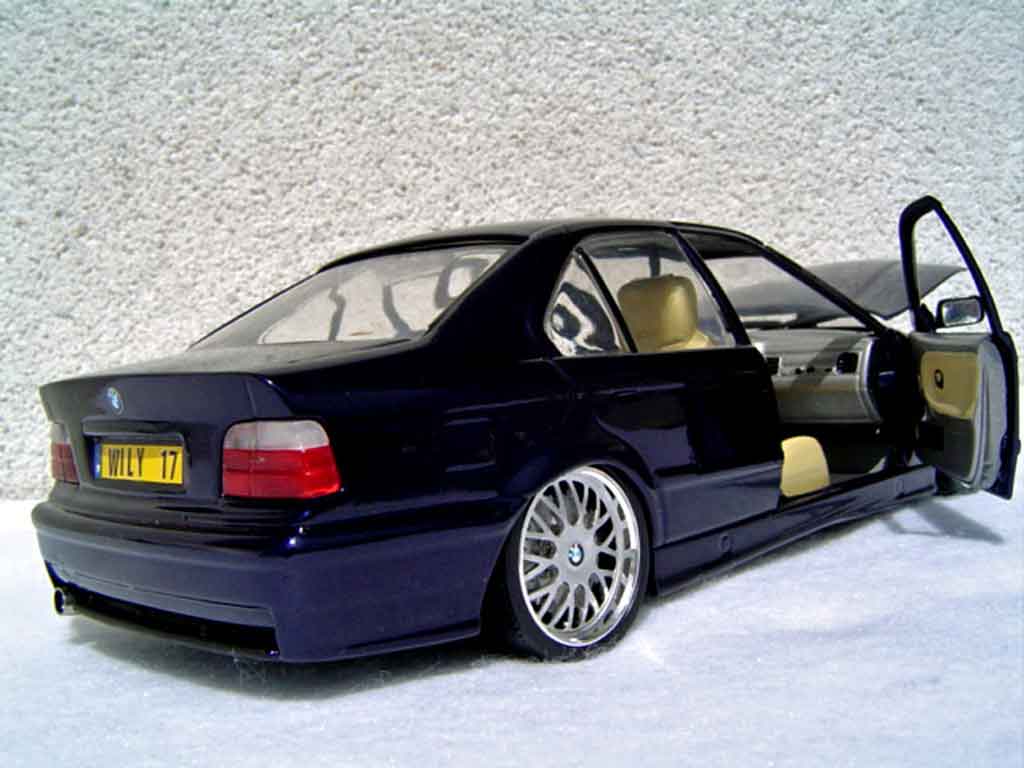 Bmw 325 kit m3 E36 sedan tds blauw metallized 1/18 Ut Models