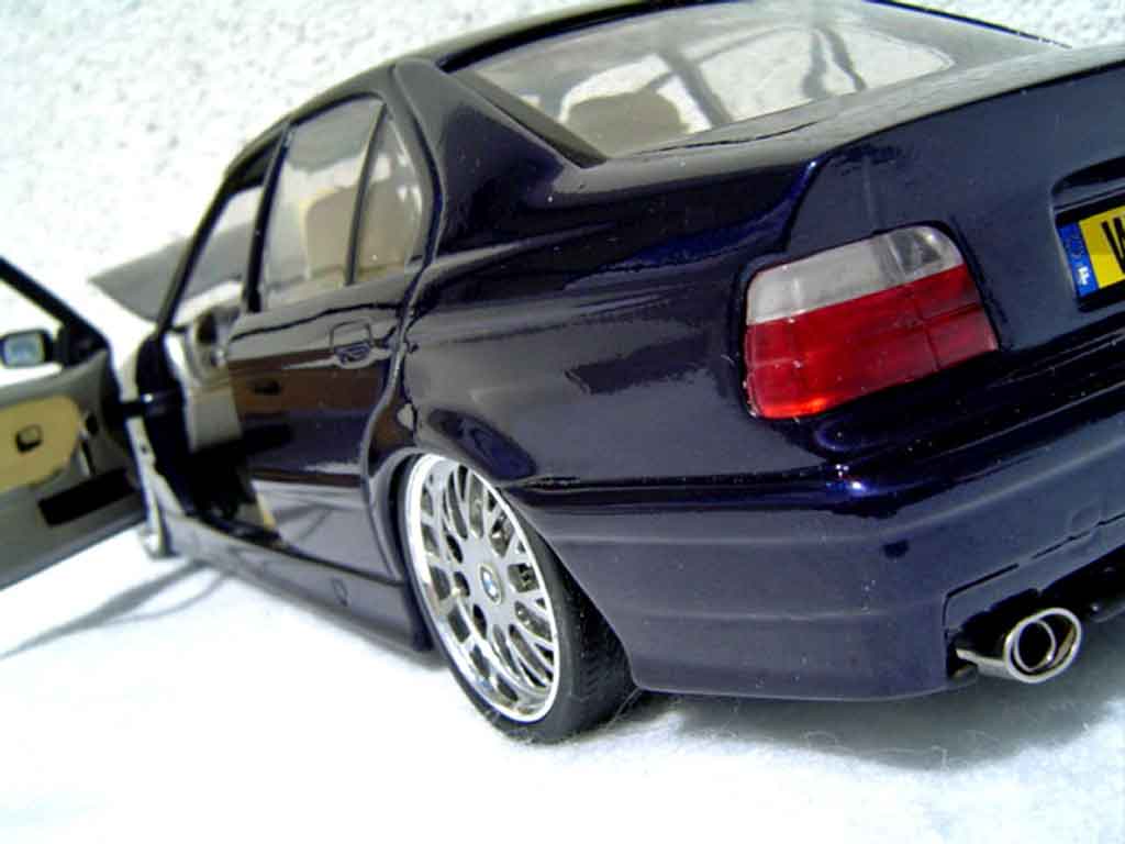 Bmw 325 kit m3 E36 sedan tds blauw metallized 1/18 Ut Models