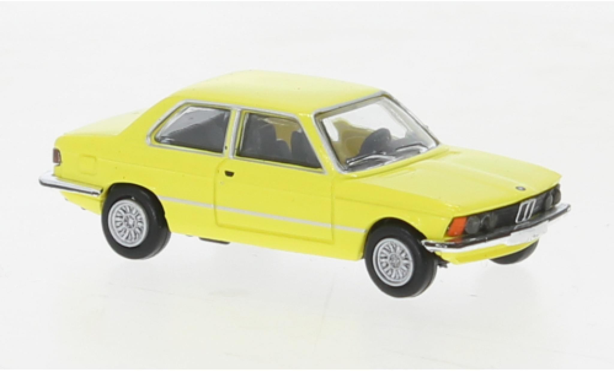 Bmw 323 1/87 Brekina i geel clair 1975 modelauto