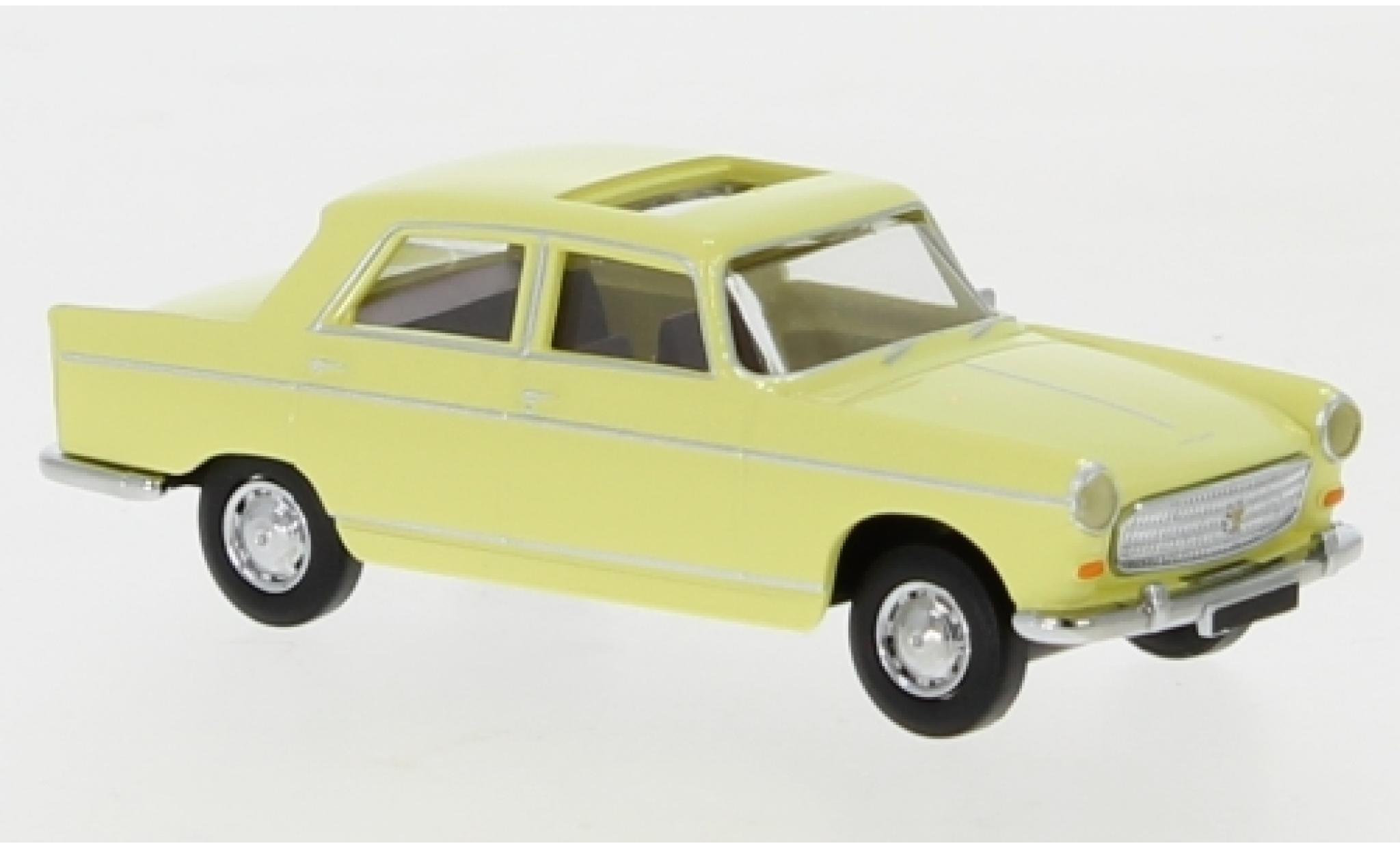 Peugeot 404 1/87 Brekina geel 1961 toit ouvrant ougroen modelauto
