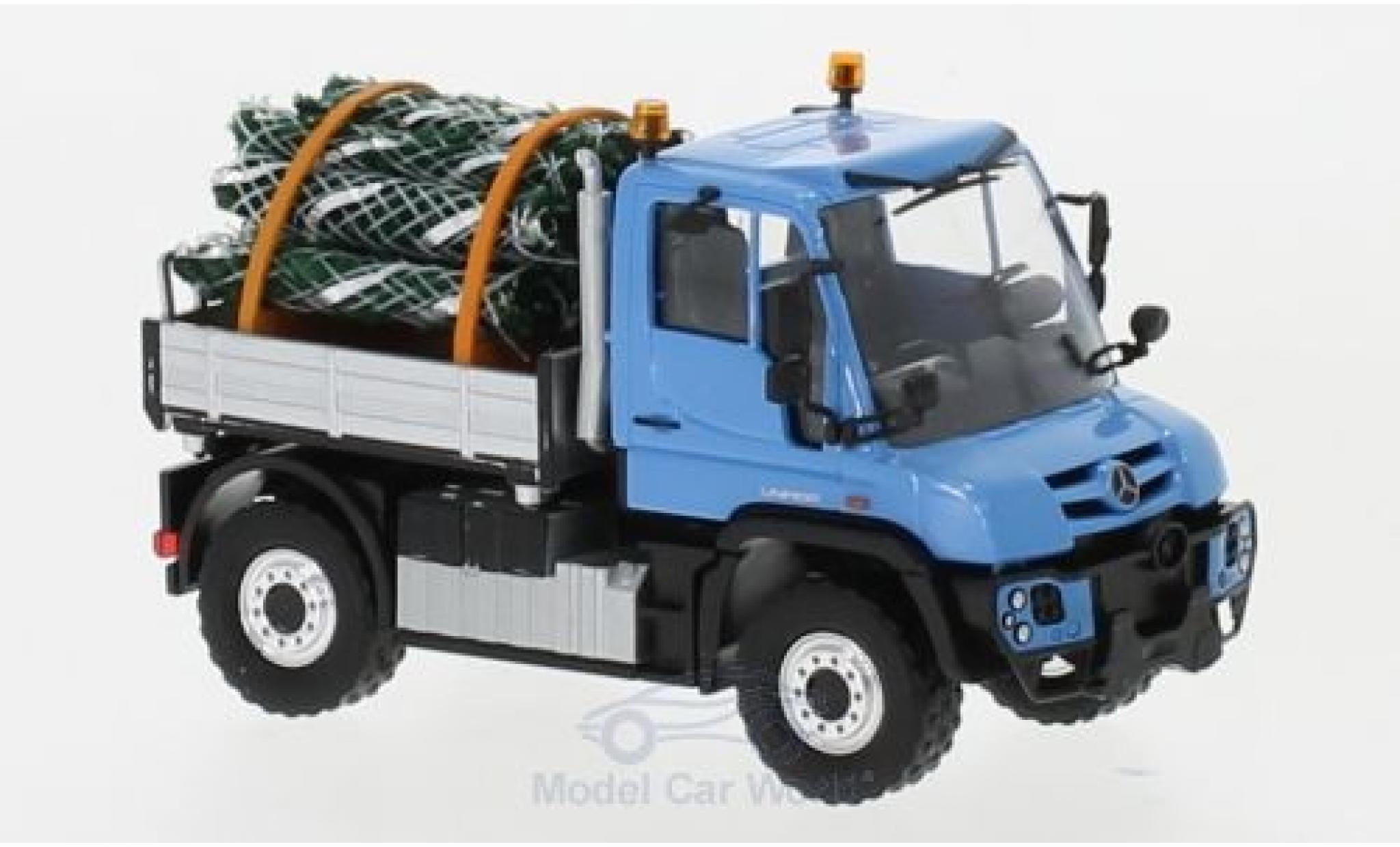 Mercedes Unimog 1/87 Busch U 430 blauw mit Christb&auml;umen modelauto