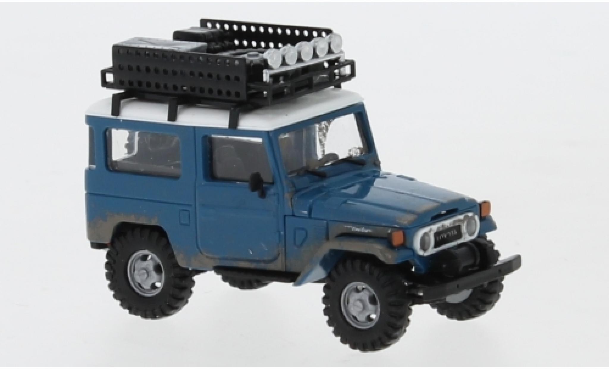 Toyota Land Cruiser 1/87 Busch J4 blauw/wit 1960 avec Rack de toit et traces d Offroad modelauto