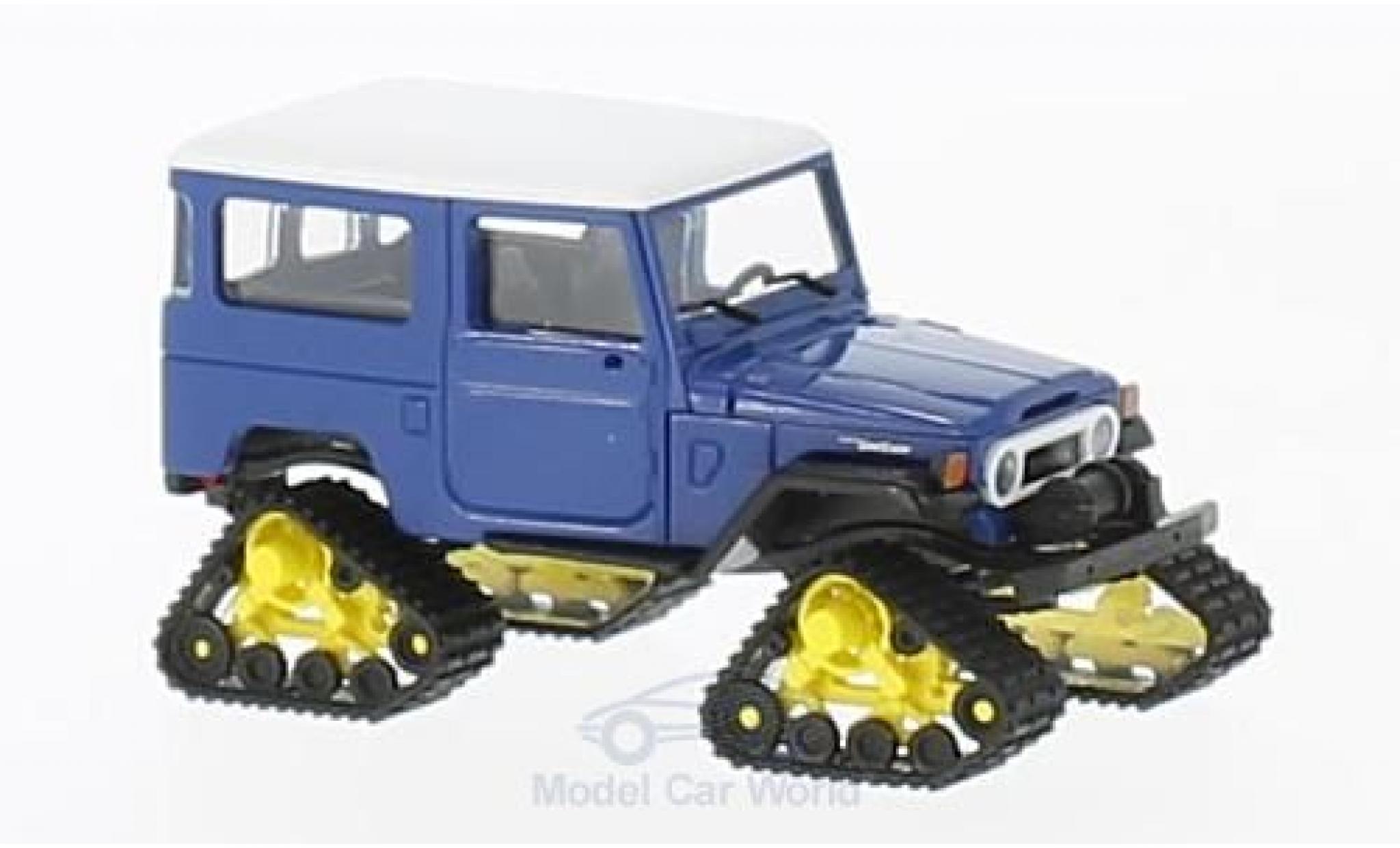 Toyota Land Cruiser 1/87 Busch J4 blauw/wit 1960 mit Raupenantrieb modelauto