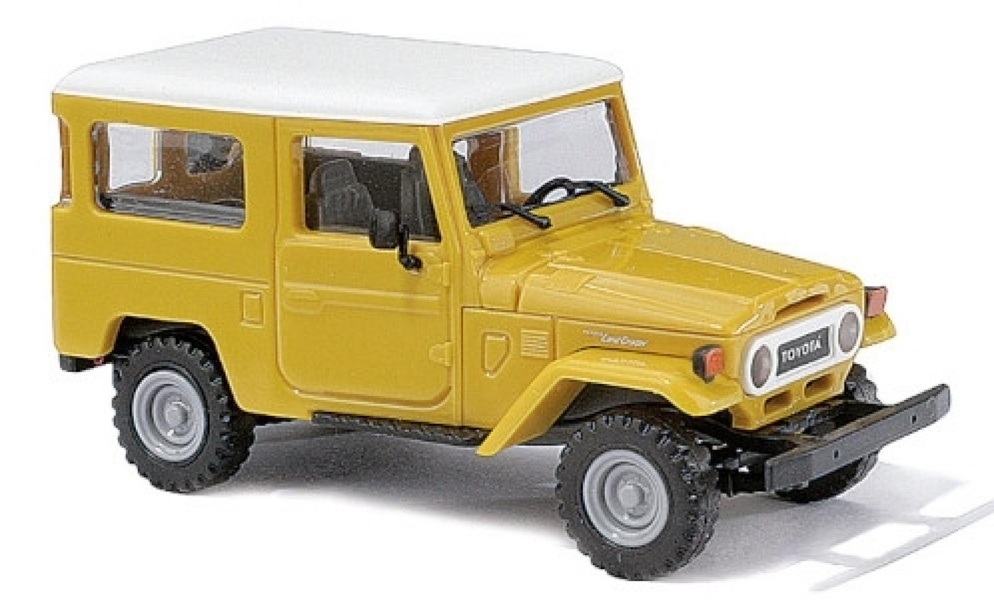 Toyota Land Cruiser 1/87 Busch J4 geel/wit 1960 modelauto