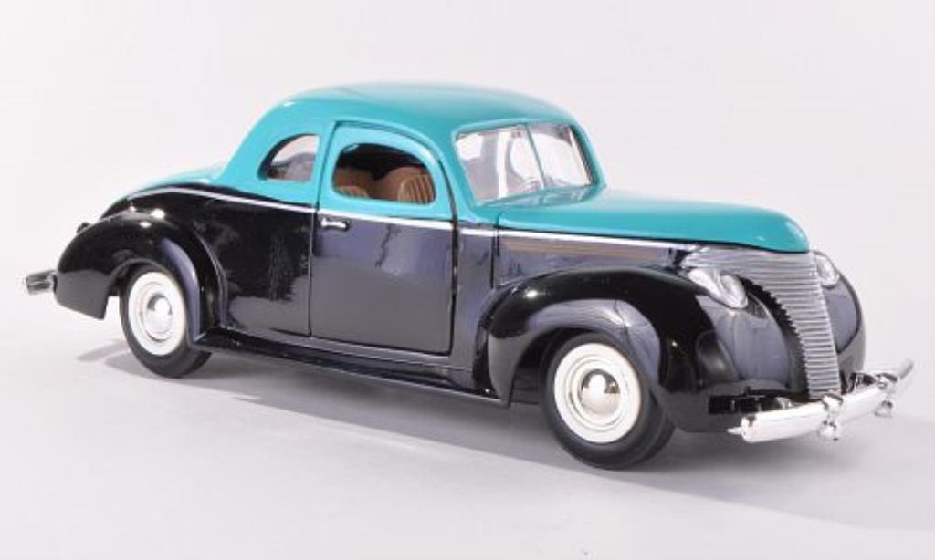 Ford Custom 1/24 Motormax zwart/turkis 1949 modelauto
