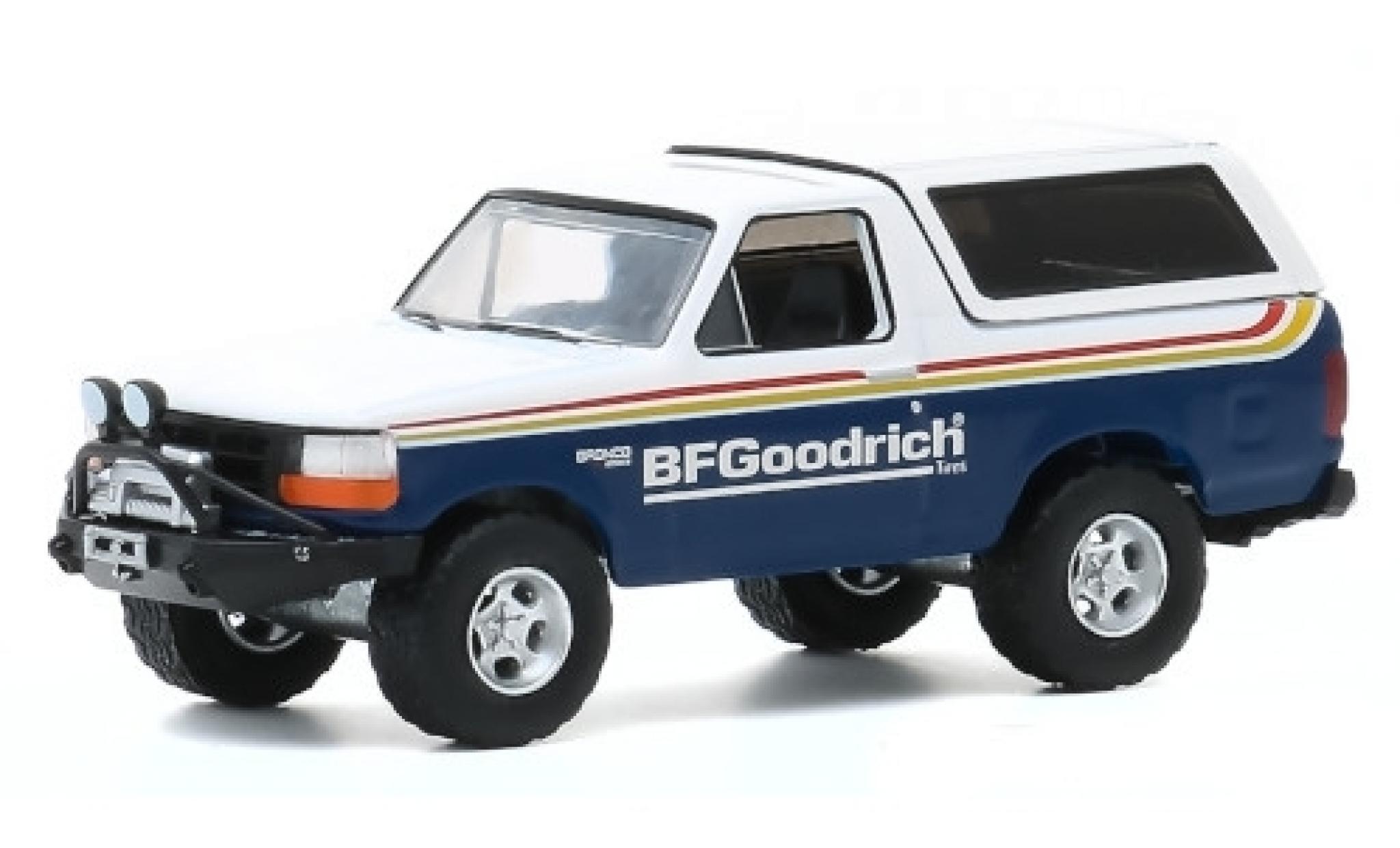 Ford Bronco 1/64 Greenlight blauw/wit BF Goodrich 1992 modelauto