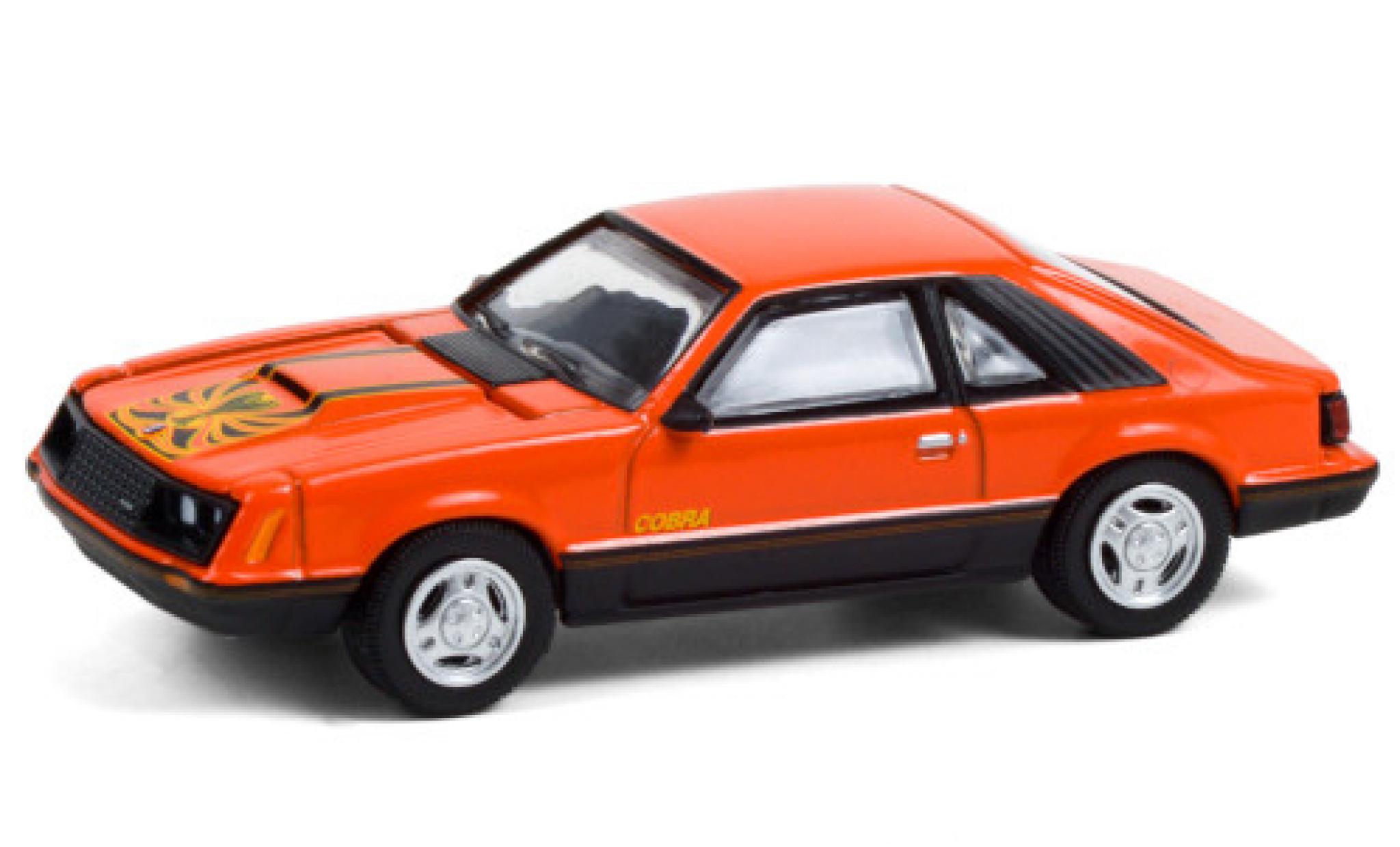 Ford Mustang 1/64 Greenlight Cobra oranje/Dekor 1979 modelauto