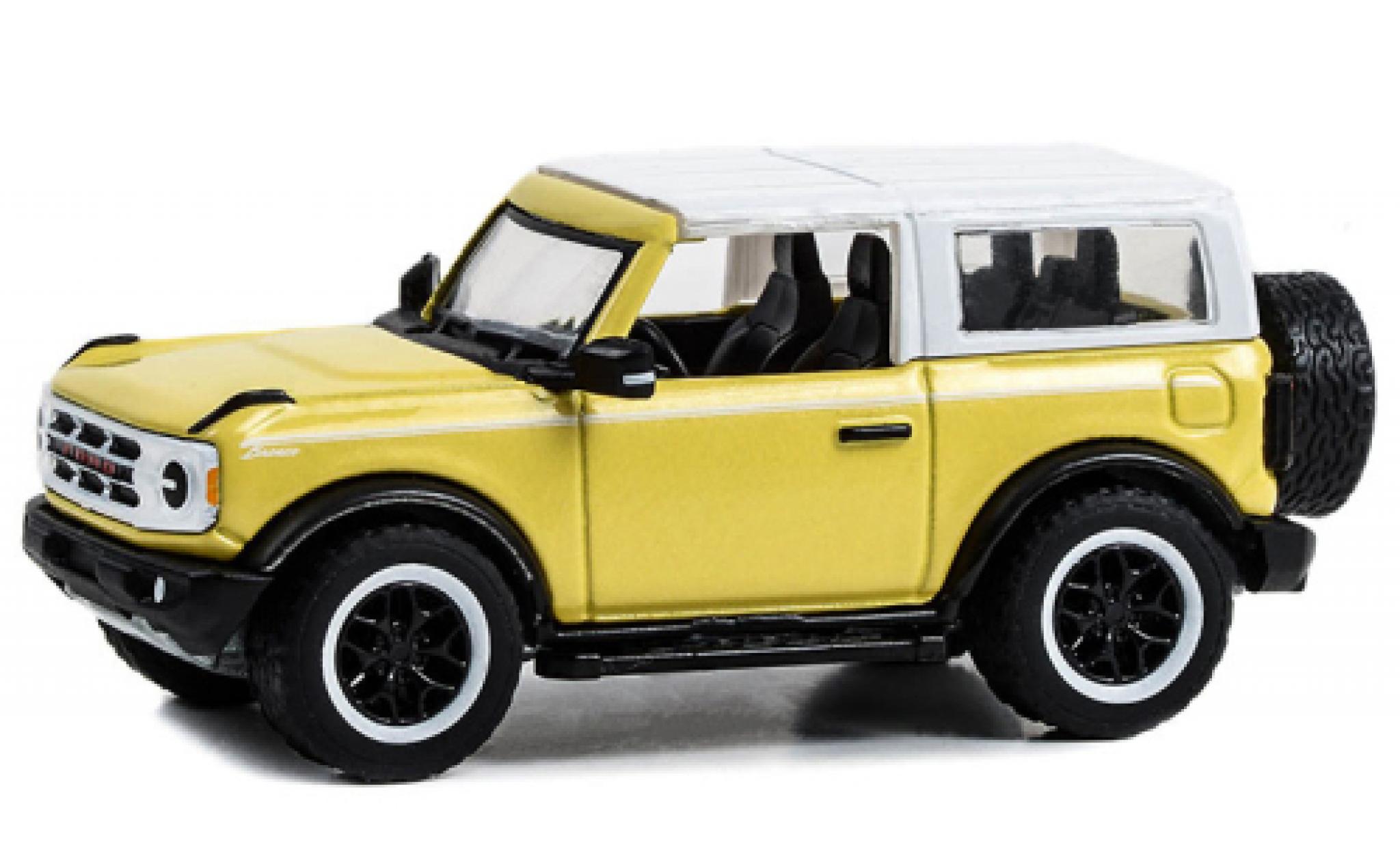 Ford Bronco 1/64 Greenlight Heritage Edition geel clair/wit 2023 modelauto