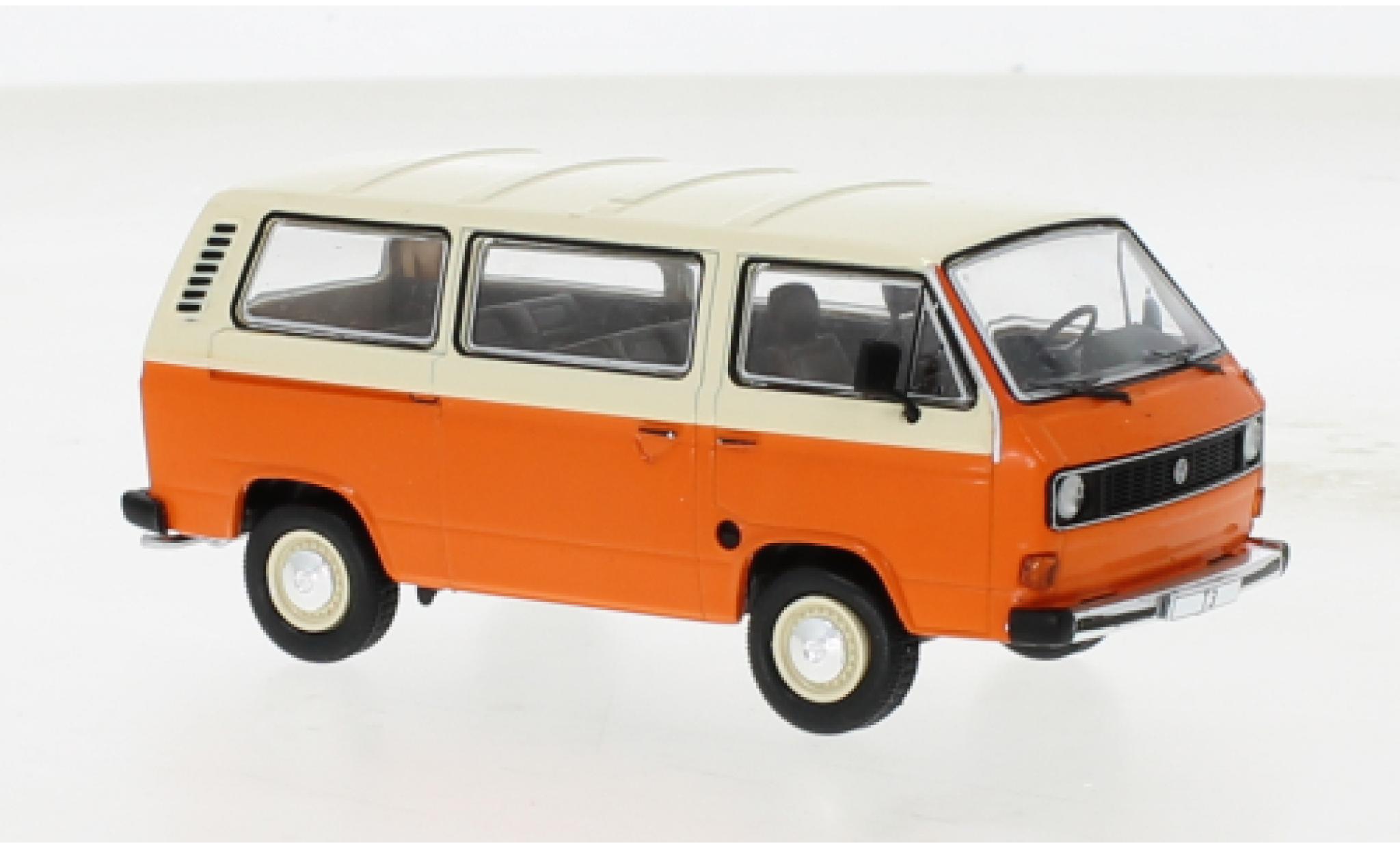 Volkswagen T3 1/43 IXO Caravelle oranje/beige 1981 modelauto