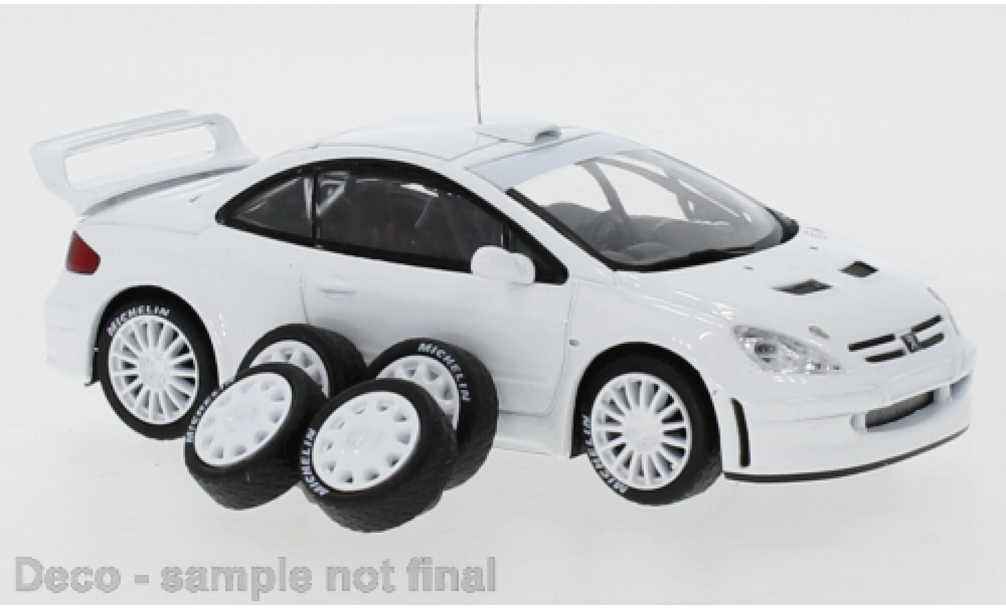 Peugeot 307 1/43 IXO WRC wit 2 set of wheels and tyres and extra rear spoiler modelauto