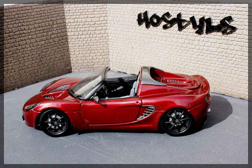 Lotus Elise 111S rood / carbon 1/18 Welly