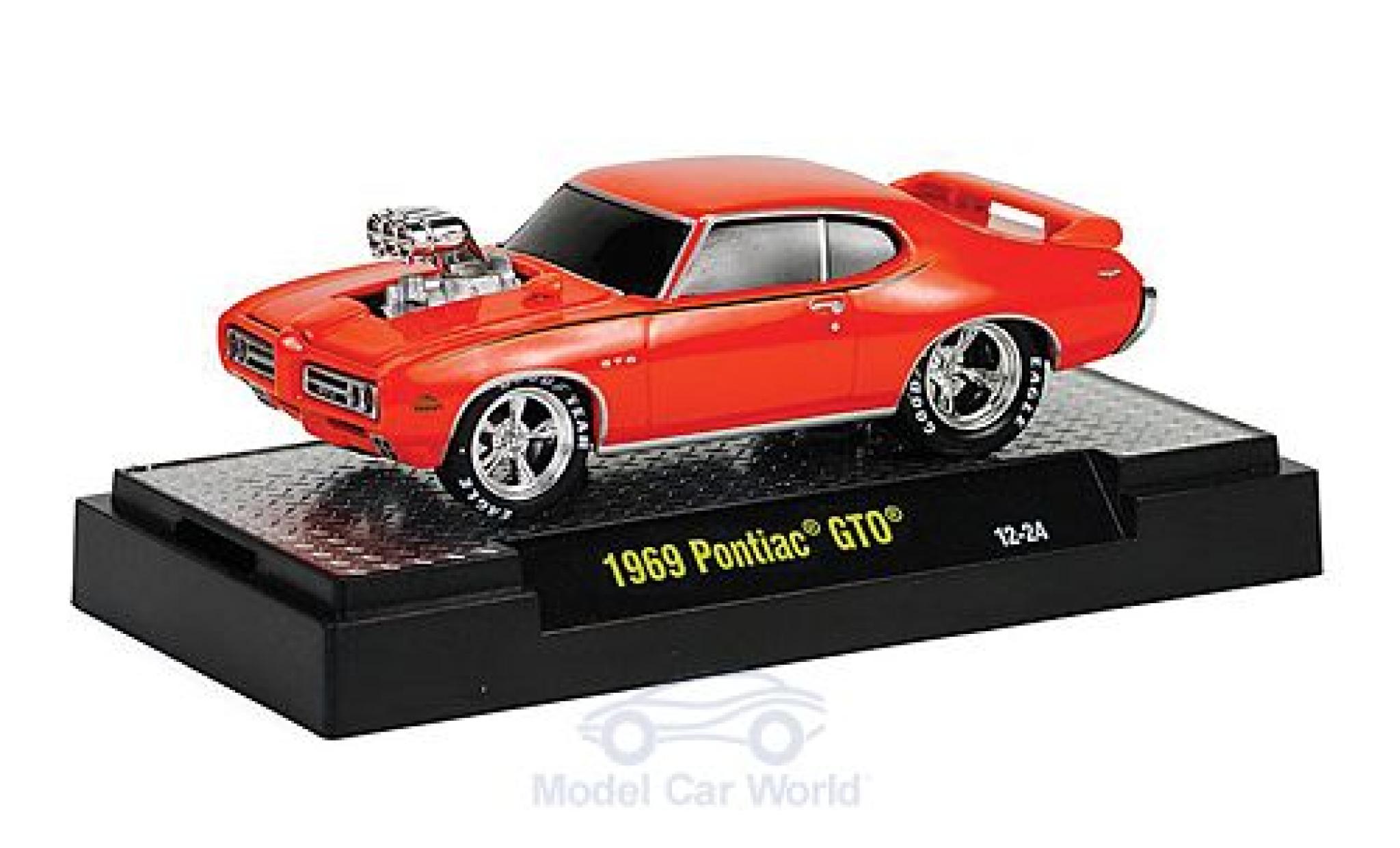 Pontiac GTO 1/64 M2 Machines oranje 1969 Motorhaube mit Funktion Ground Pounders modelauto