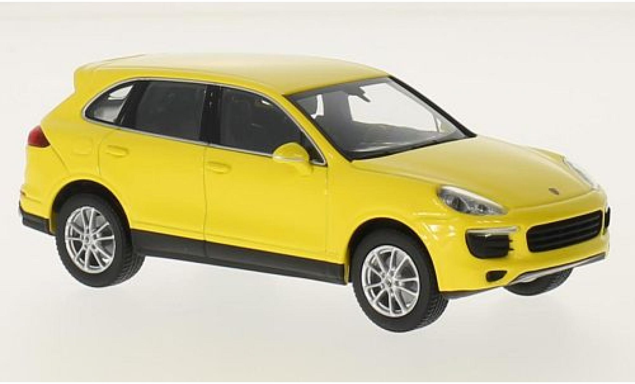 Porsche Cayenne 1/43 Maxichamps geel 2014 modelauto
