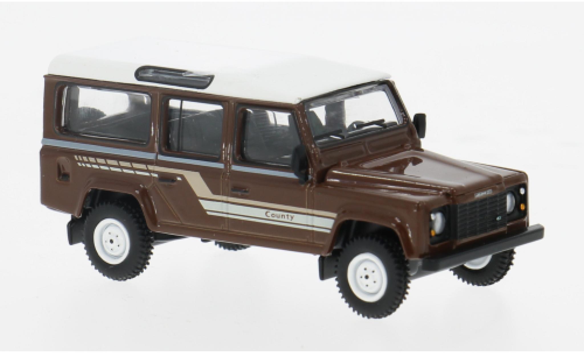 Land Rover Defender 1/64 Mini GT 110 County Station Wagon bruin 1985 1:64 modelauto