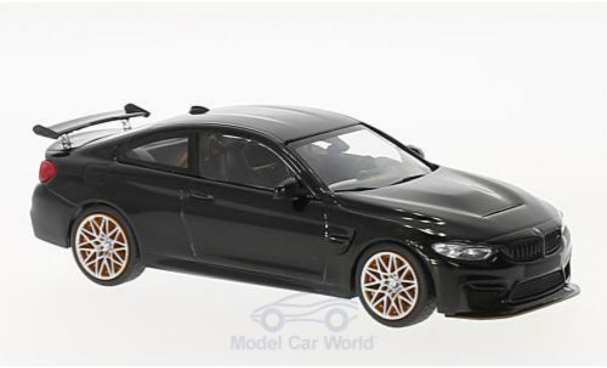 Bmw M4 1/43 Minichamps (F82) GTS metallic zwart 2016 mit oranjen Felgen modelauto