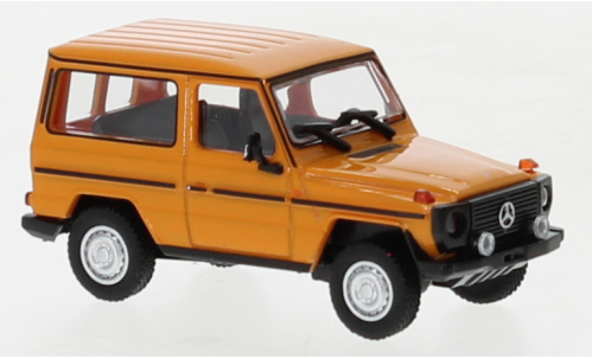 Mercedes Classe G 1/87 Minichamps G-Mod&egrave;le SWB (W460) oranje 1980 modelauto
