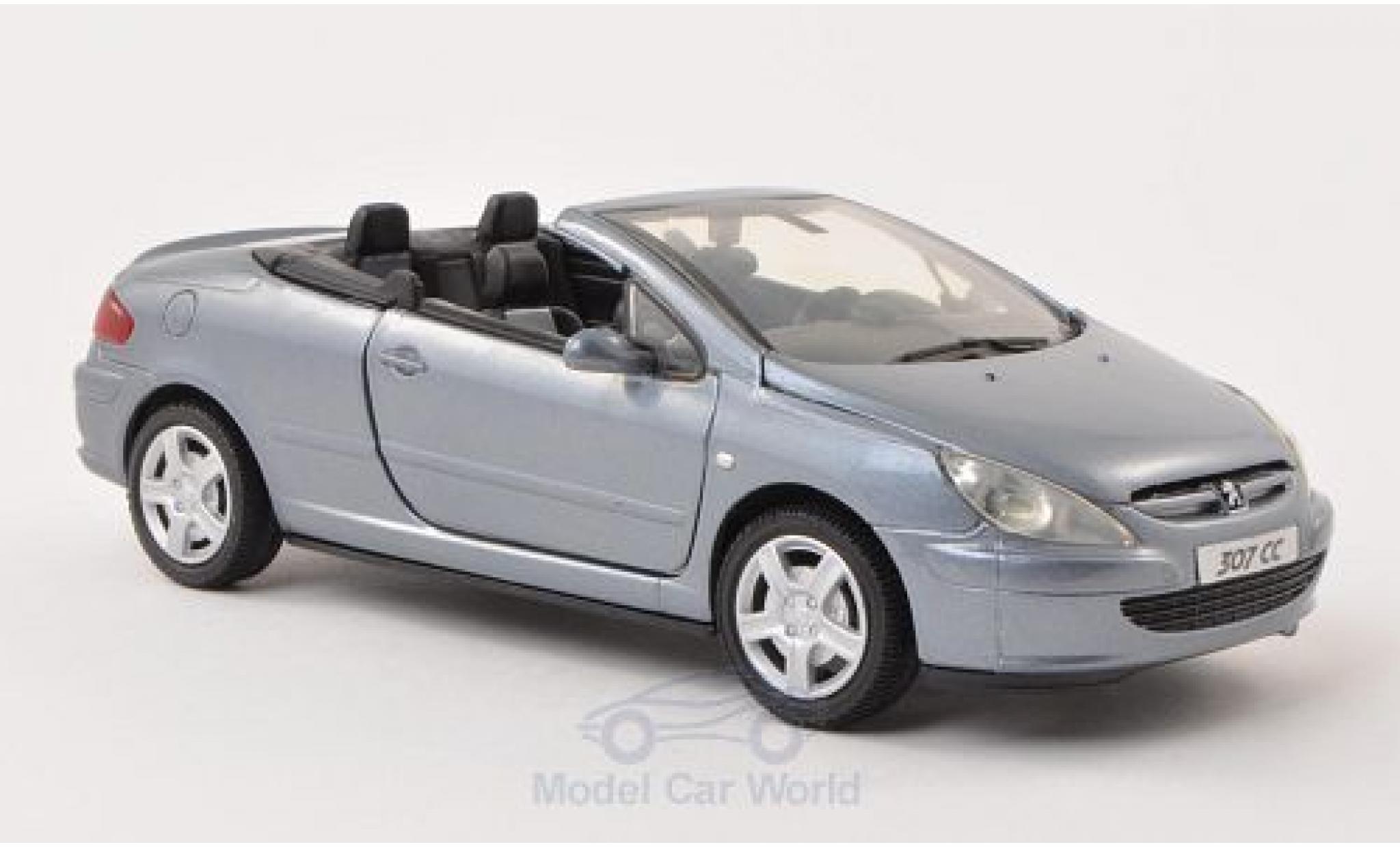 Peugeot 307 1/24 Motormax CC metallic blauw ohne Vitrine modelauto