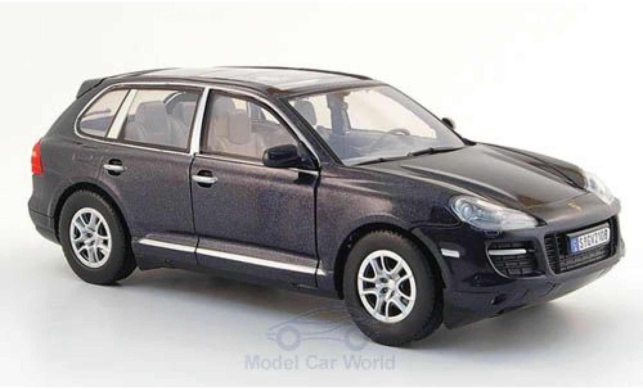 Porsche Cayenne 1/24 Motormax metallic zwart ohne Vitrine modelauto