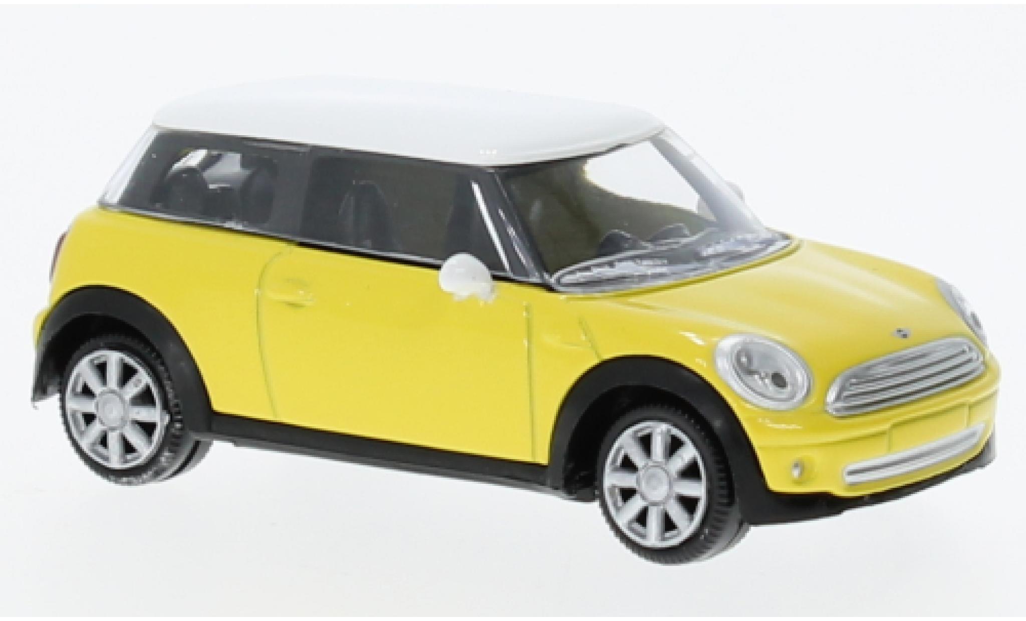 Mini Cooper 1/64 Norev un geel 2006 modelauto