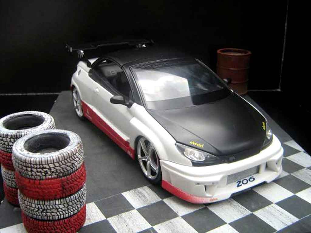 Peugeot 206 CC 1/18 Norev CC paroodech racing modelauto
