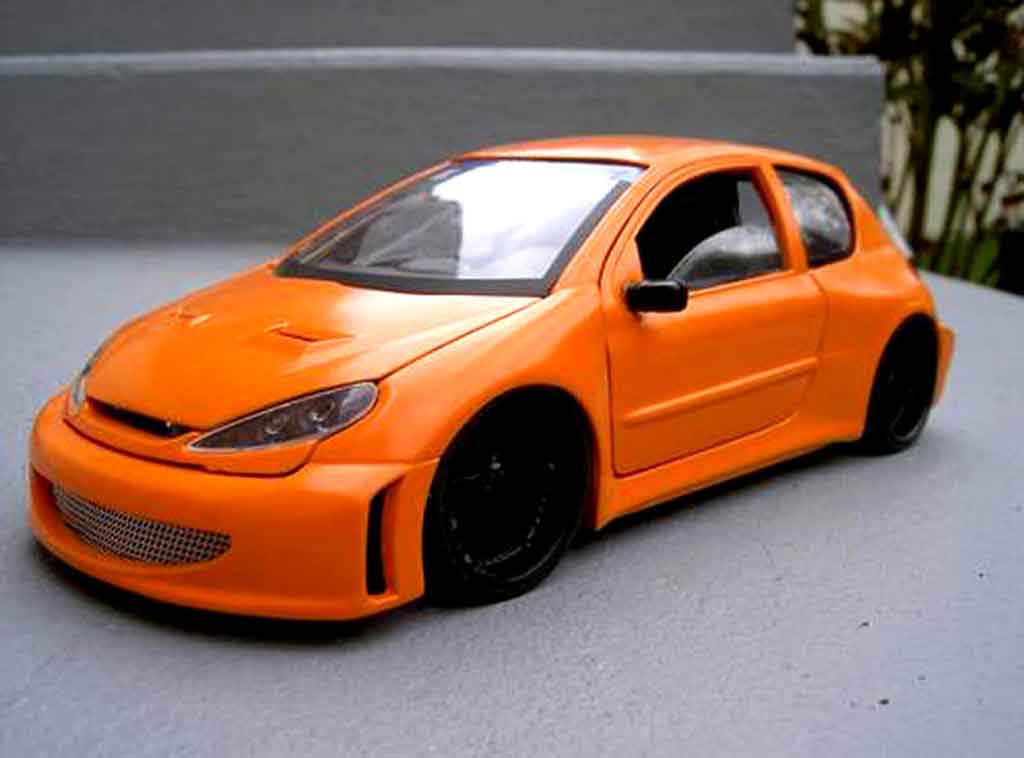 Peugeot 206 WRC street racing oranje 1/18 Solido