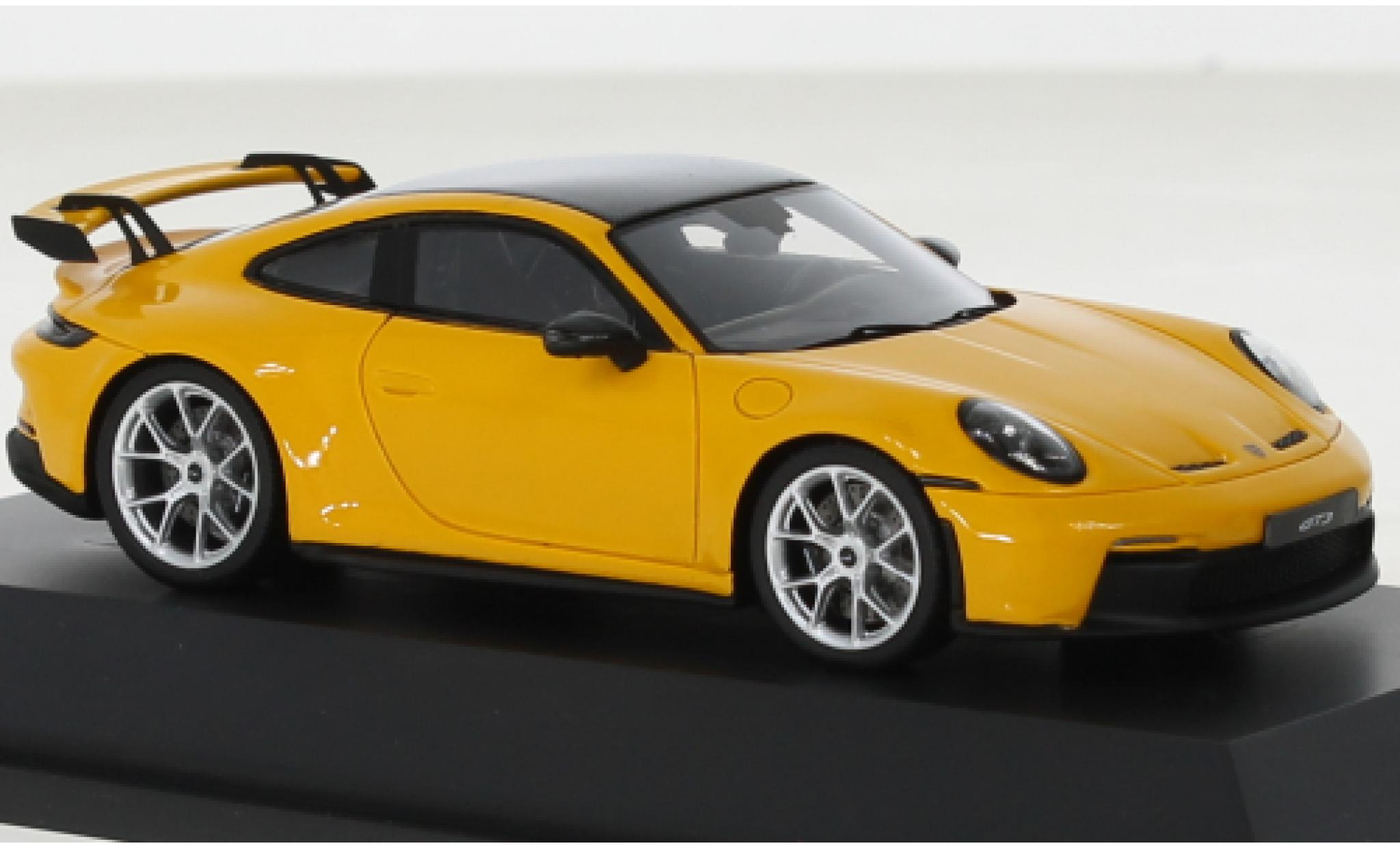 Porsche 992 GT3 1/43 Schuco 911  geel modelauto