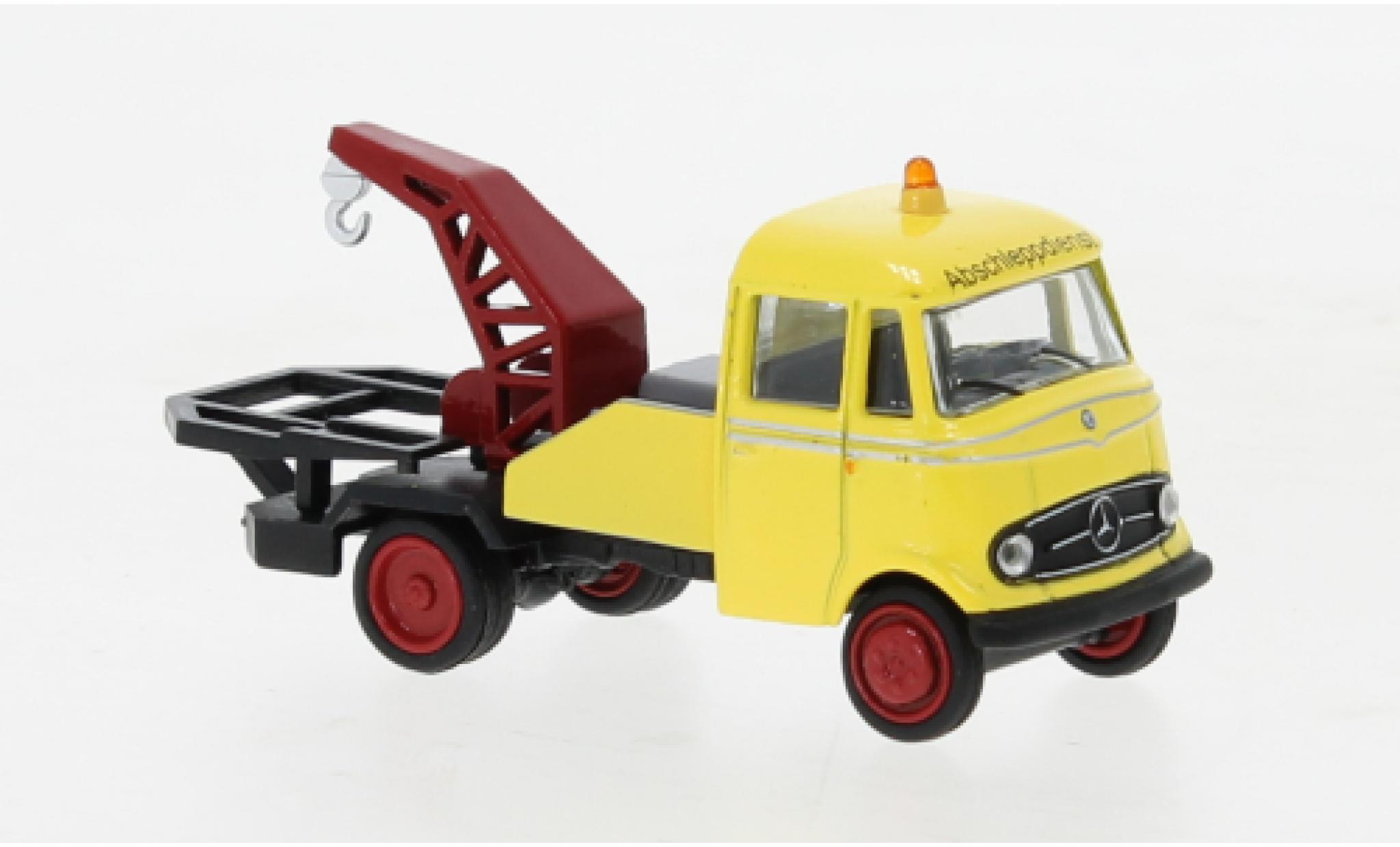 Mercedes L319 1/87 Schuco Abschleppwagen geel modelauto