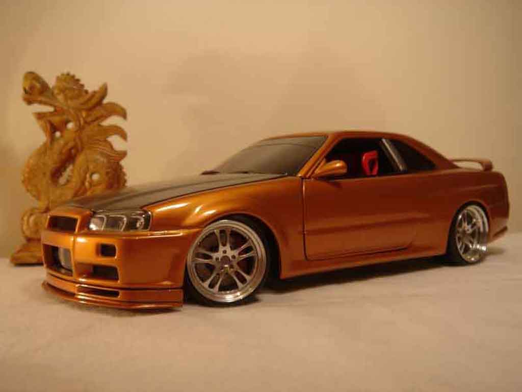 Nissan Skyline R34 oranje carbon kit nos 1/18 Autoart