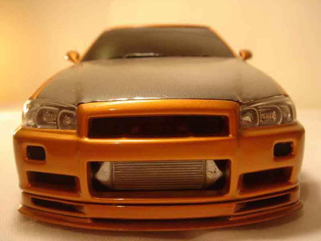 Nissan Skyline R34 oranje carbon kit nos 1/18 Autoart
