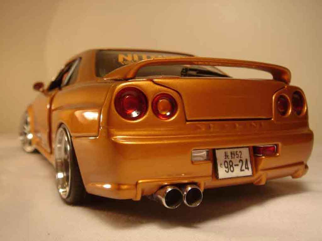 Nissan Skyline R34 oranje carbon kit nos 1/18 Autoart