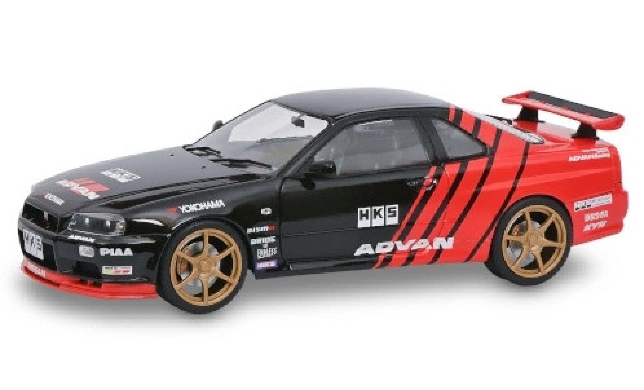 Nissan Skyline 1/18 Solido GT-R (R34) zwart/rood RHD Advan 1999 modelauto