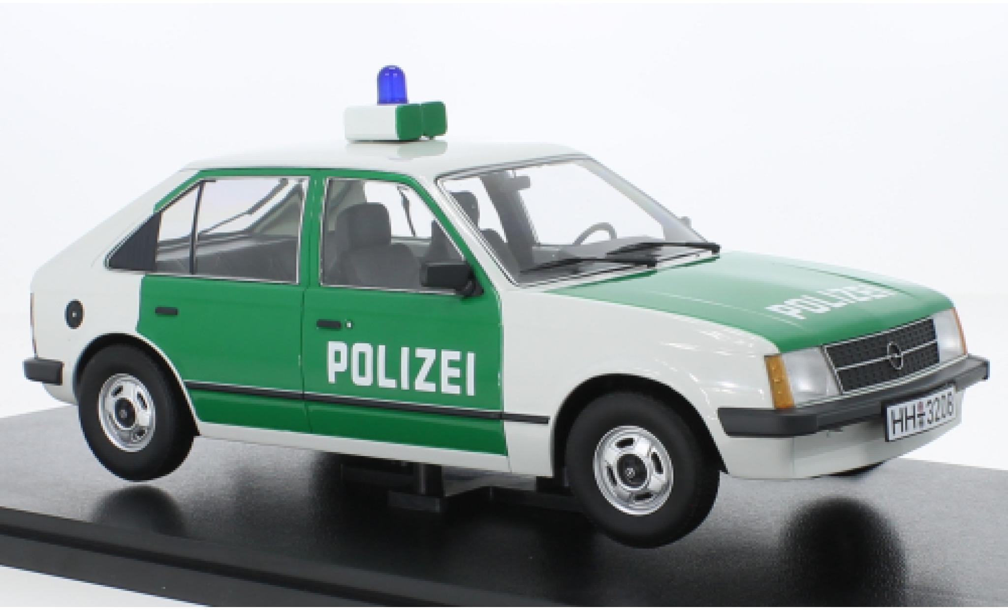 Opel Kadett 1/18 Triple 9 Collection D politie modelauto