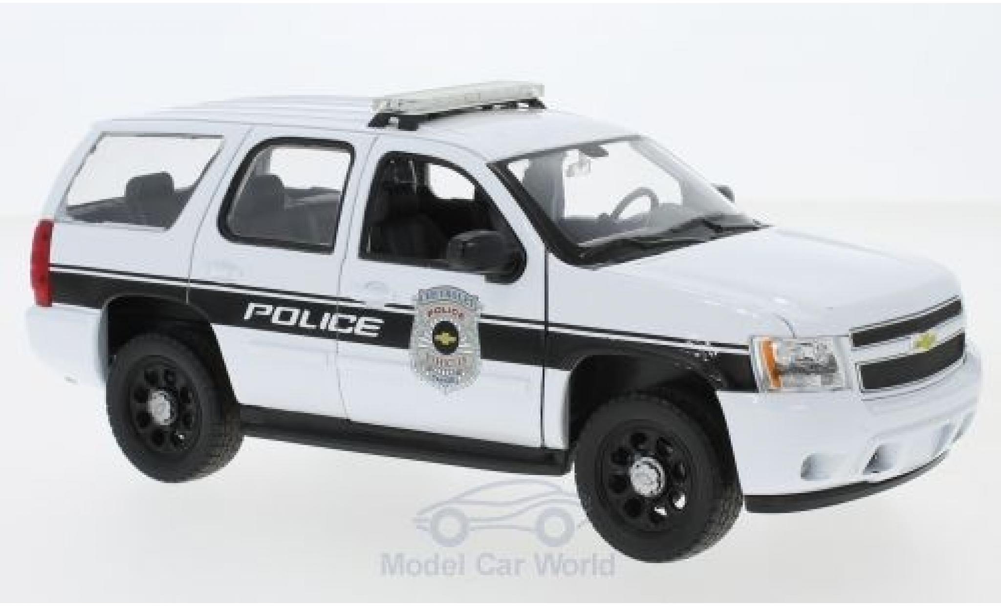 Chevrolet Tahoe 1/24 Welly wit General Motors Politie Vehicles 2008 modelauto