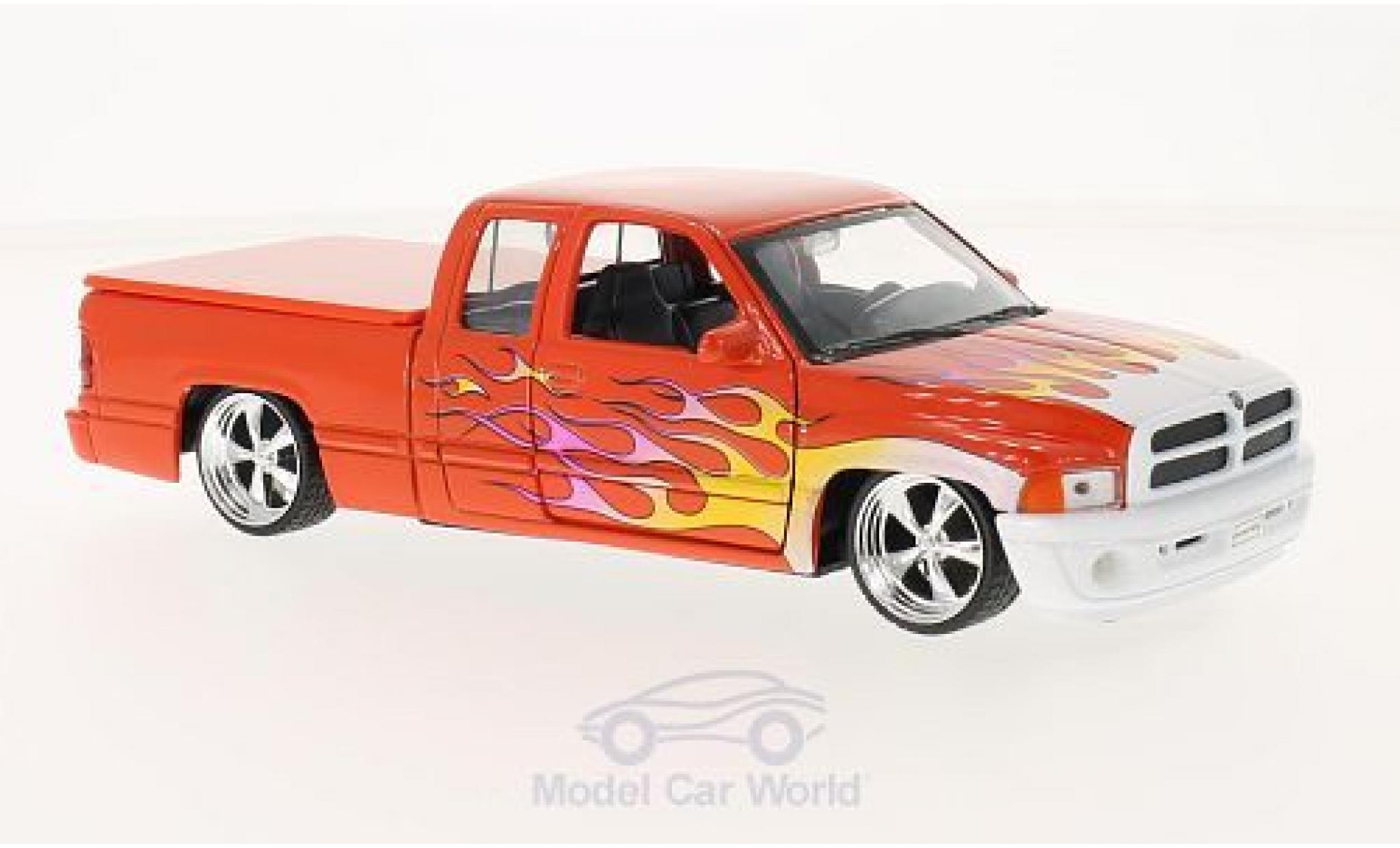Dodge RAM 1/24 Welly Ram Quad Cab 1500 Sport oranje/Dekor modelauto