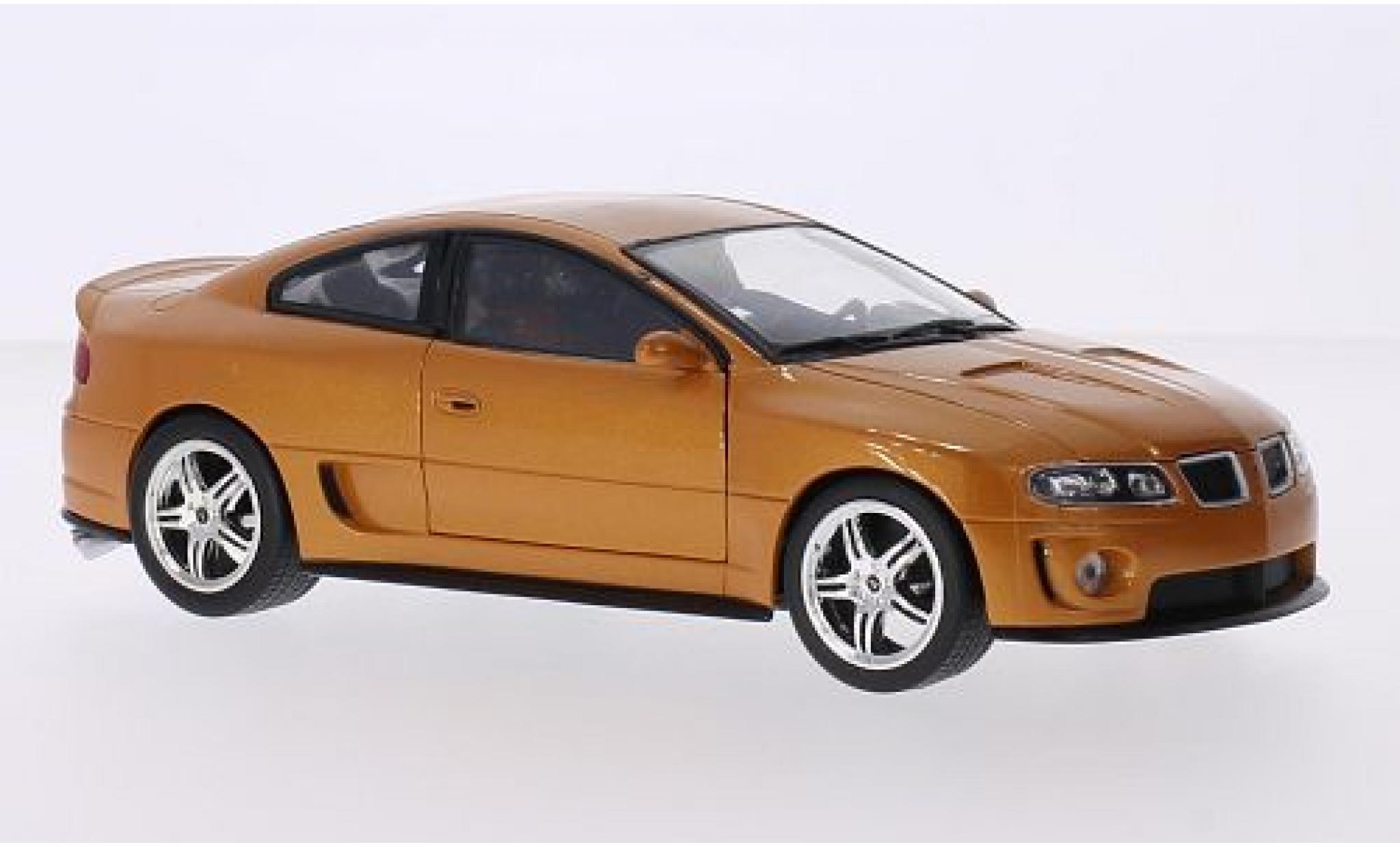 Pontiac GTO 1/24 Welly Ram Air 6 gold modelauto