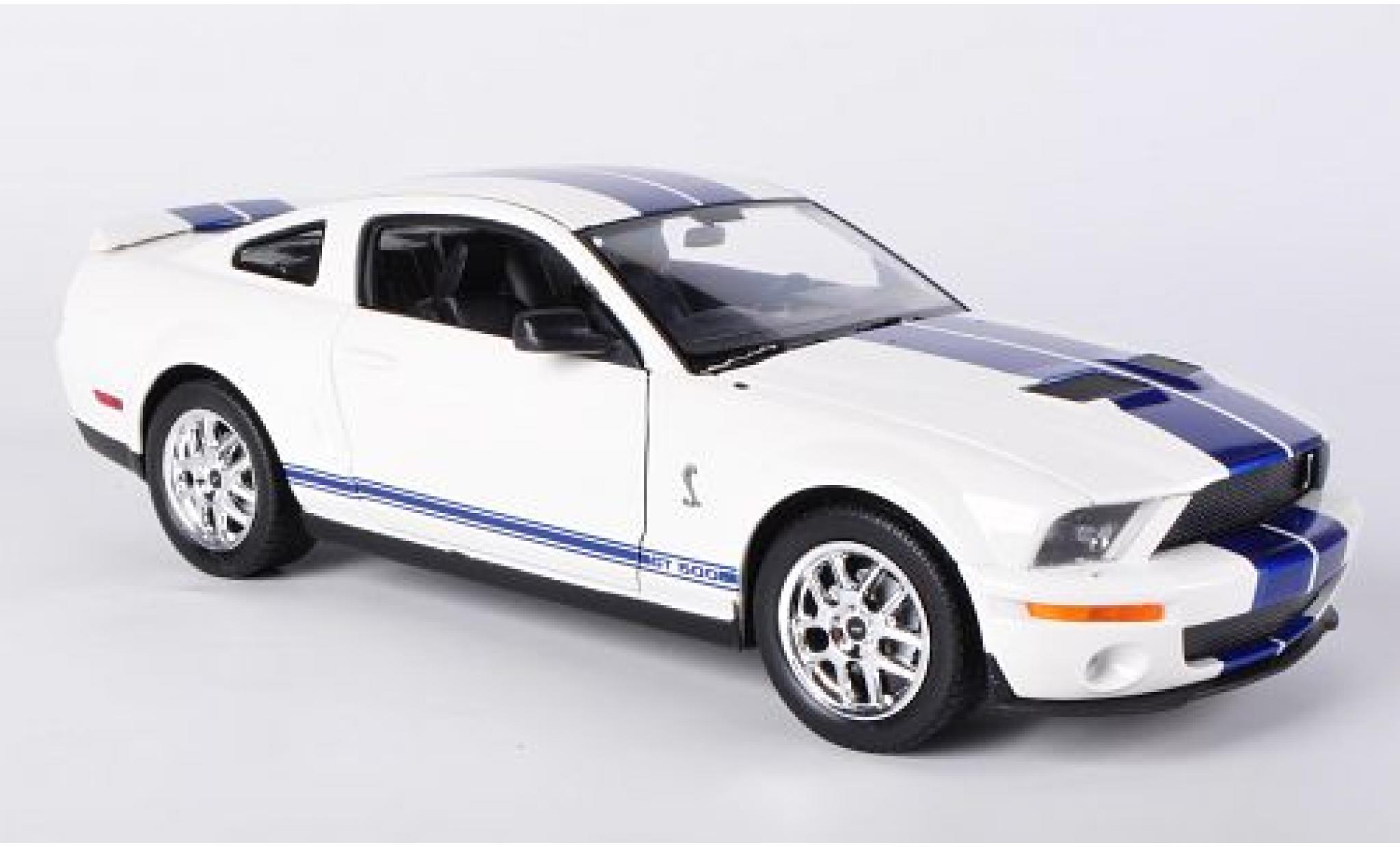 Shelby Cobra 1/24 Welly GT500 wit/blauw 2007 sans Vitrine modelauto