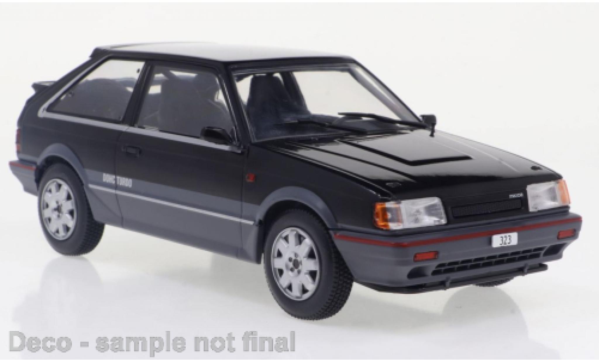 Mazda 323 1/24 WhiteBox 4WD Turbo zwart/metallic grijs 1989 modelauto