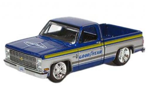 Modelauto Chevrolet Silverado pickup Goodyear 1983 1/64 Auto World