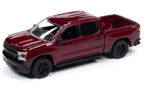 Modelauto Chevrolet Silverado pickup Z71 Douane Trail Boss metallic rood 2019 1/64 Auto World