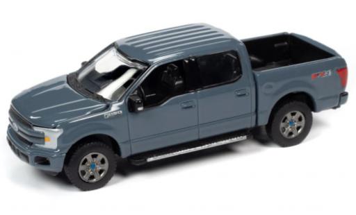 Modelauto Ford F-150 Pickup 50 Lariat grijs 2019 1/64 Auto World
