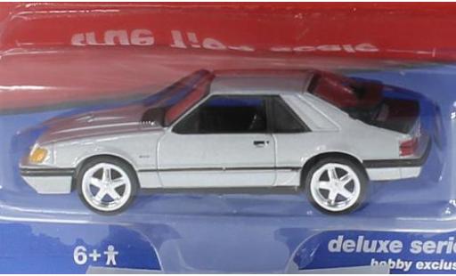 Modelauto Ford Mustang SVO grijs 1984 1/64 Auto World