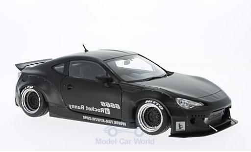 Modelauto Toyota 86 Rocket Bunny Rocket Bunny mat-zwart Ambulance Team Heidelberg KTW zwarte Felgen 1/18 AUTOart