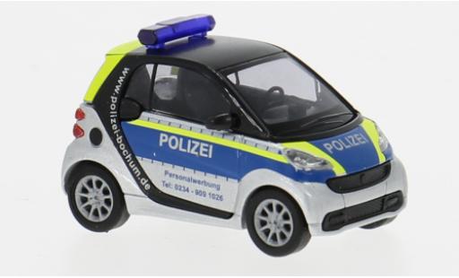 Modelauto Smart ForTwo Coupe 2012 Politie Bochum 1/87 Busch